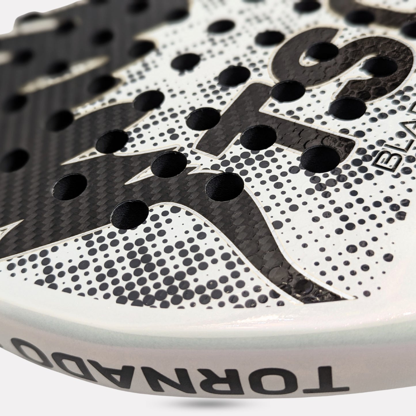 close up of a white padel racket