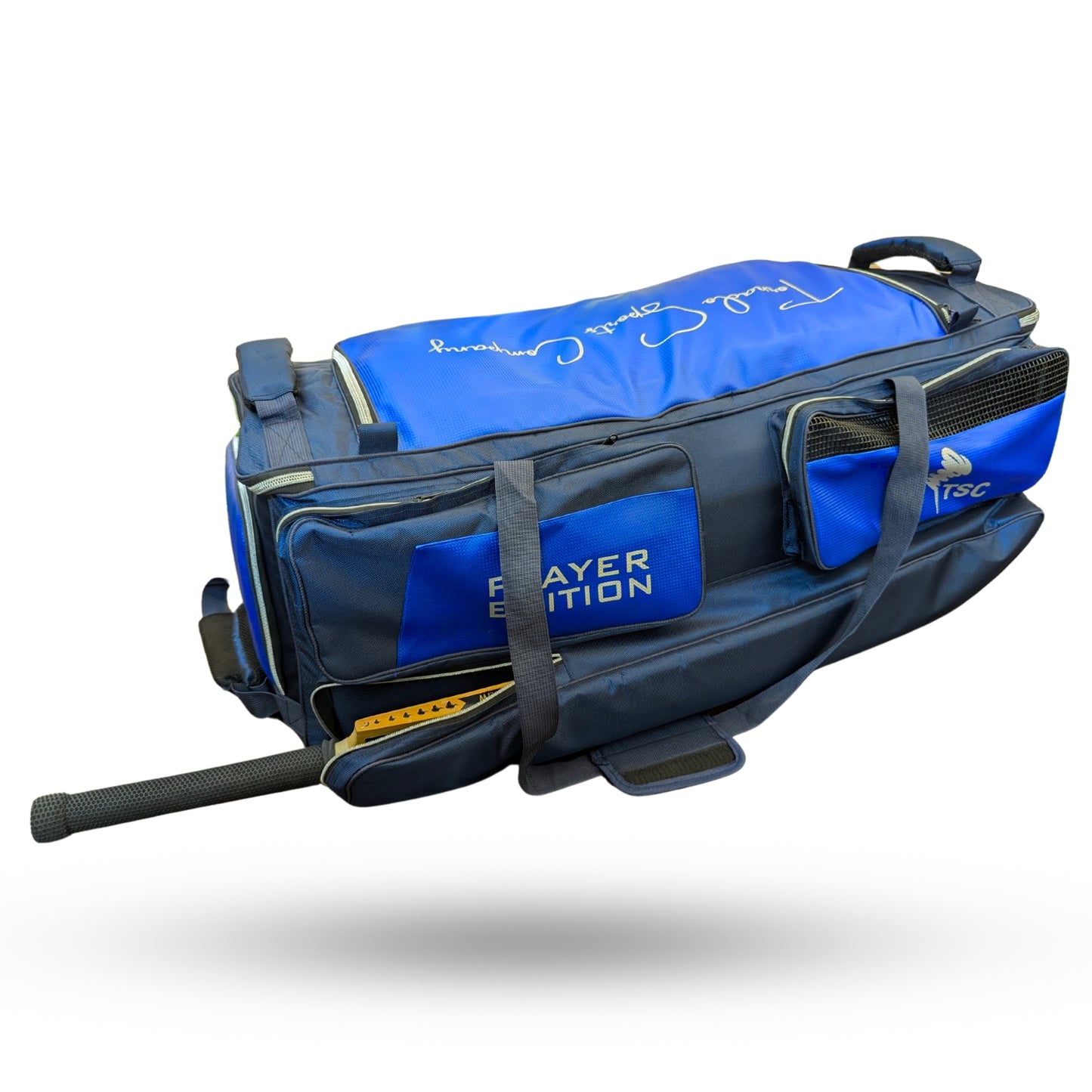 Spacious interior of navy blue cricket bag with dedicated equipment storage