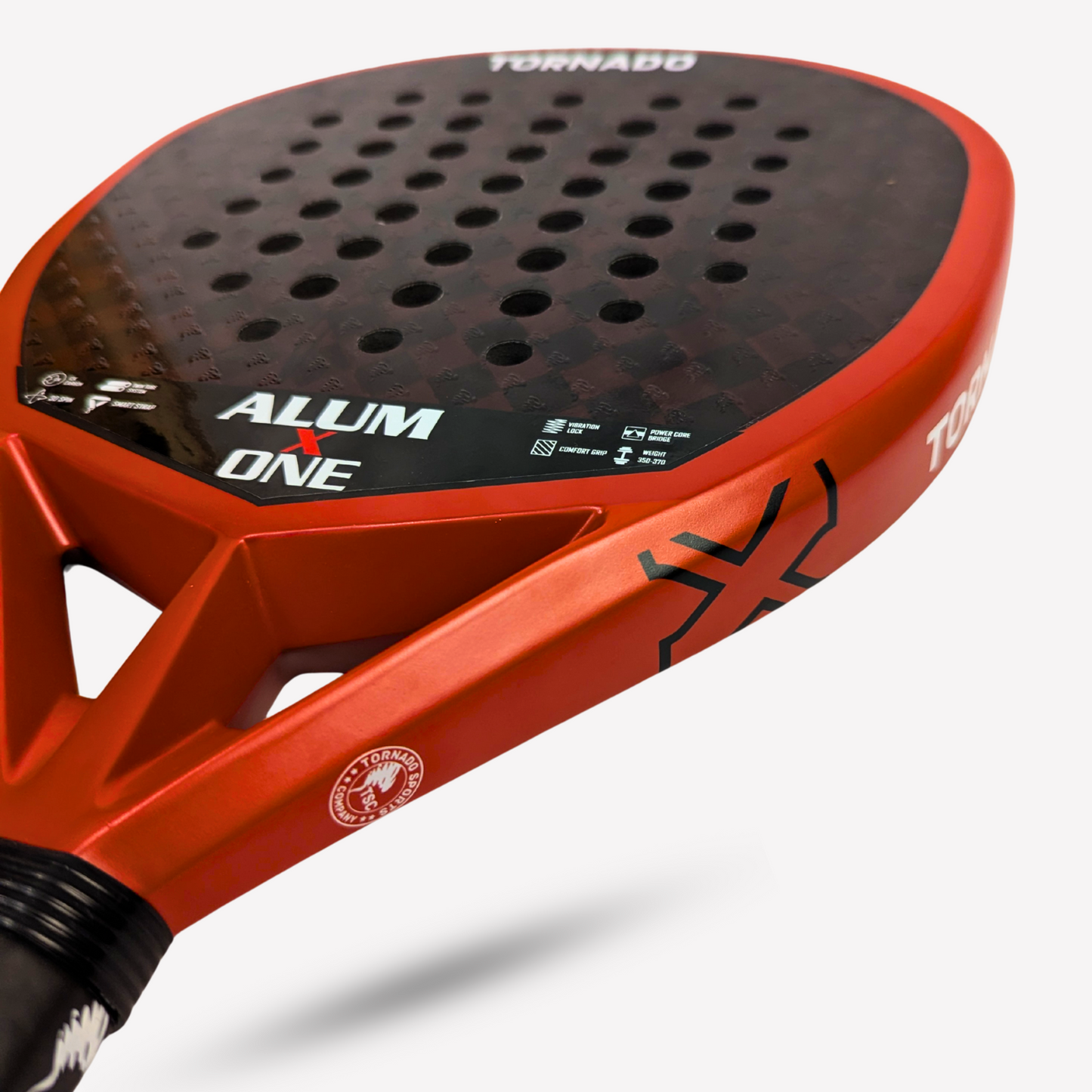 Premium padel racket in red by Tornado Sports, featuring carbon fiber face and smart cushion strap.