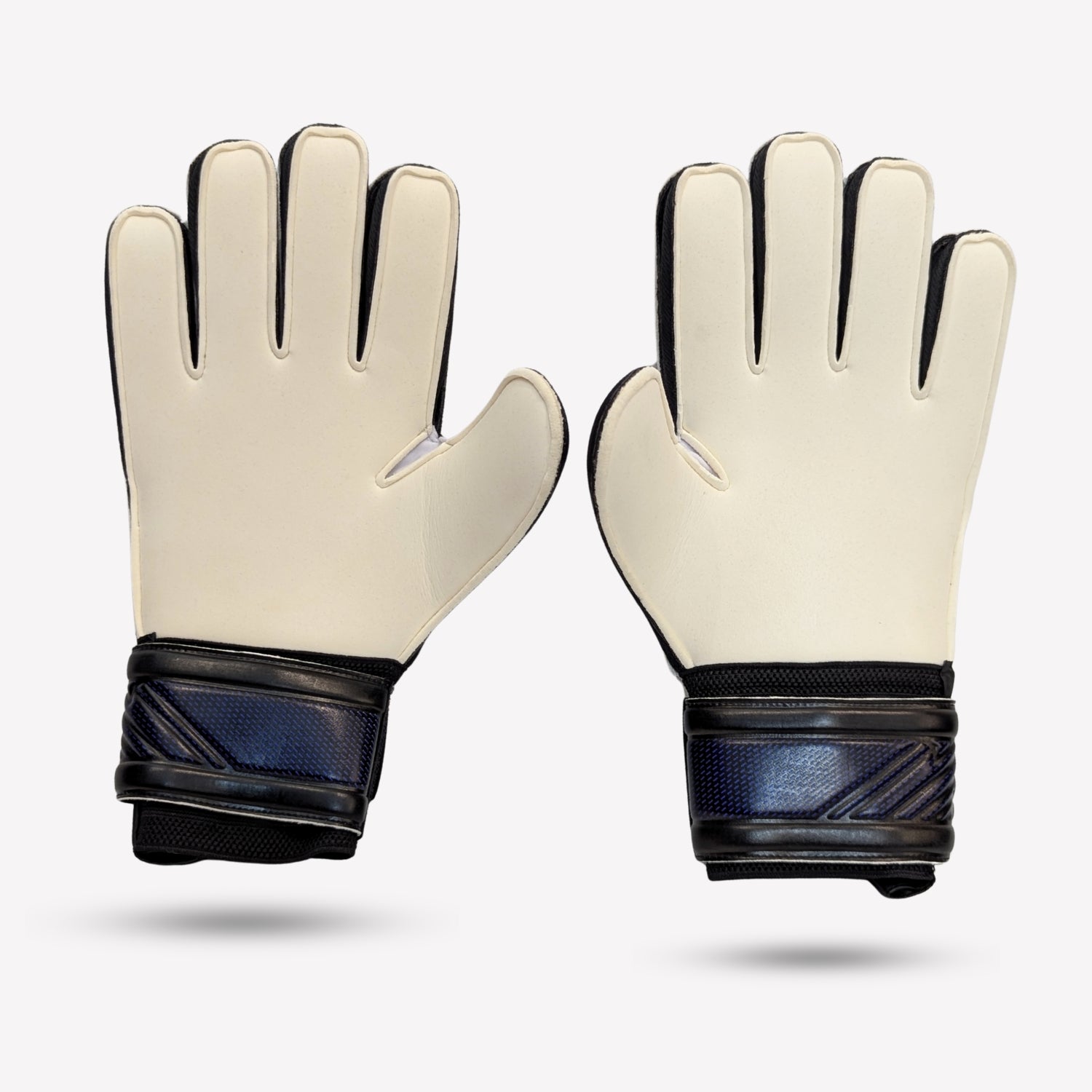 Pair of white goalkeeper gloves with black accents on a light gray background