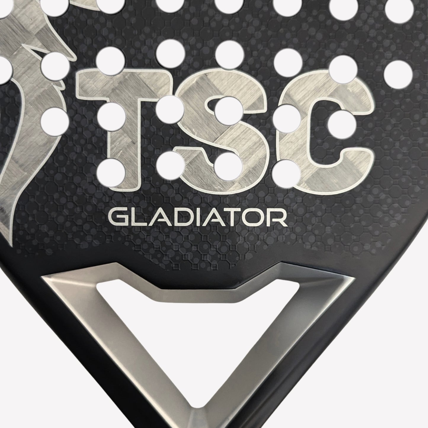 Close-up of a TSC Gladiator product with metallic text on a textured background