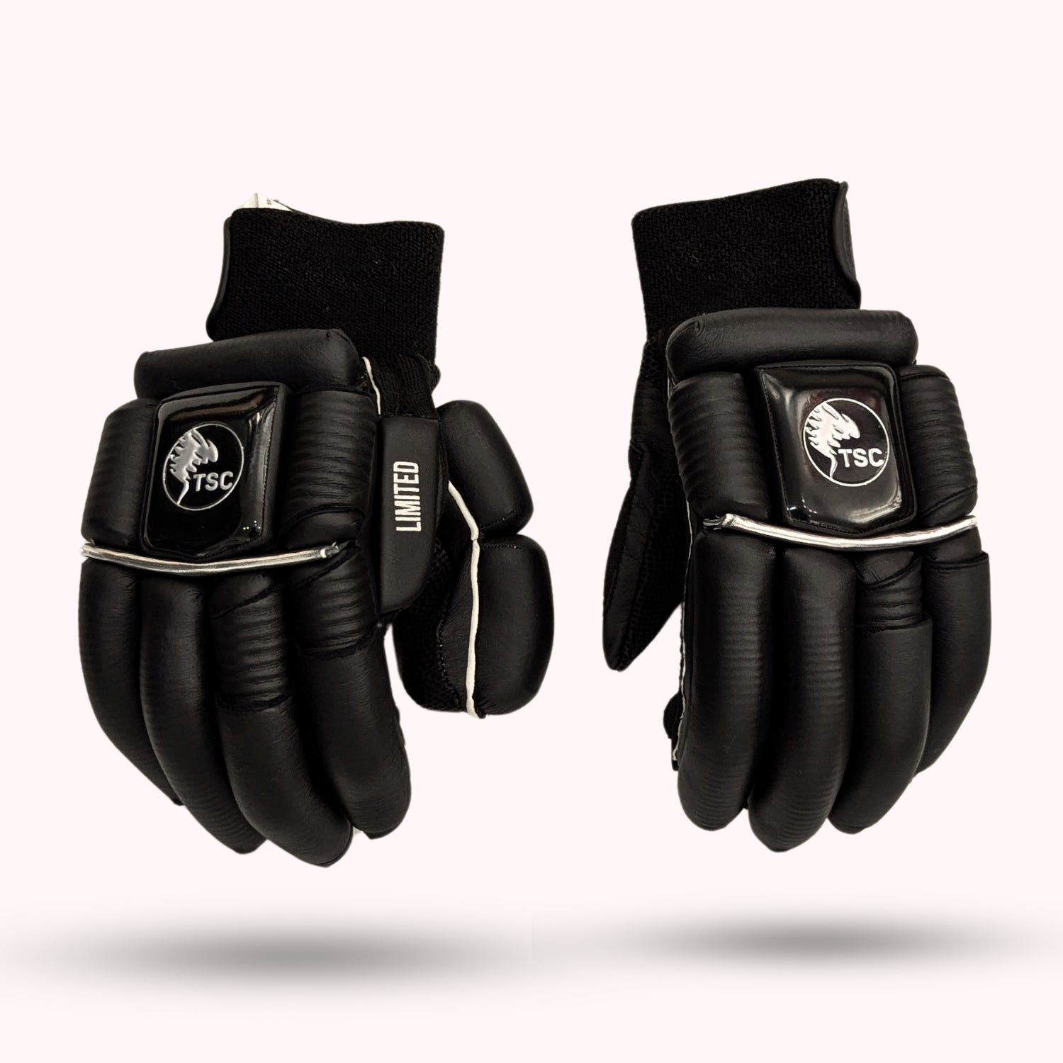 Black Python cricket gloves with silver branding