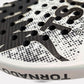 close up of a white padel racket