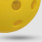  outdoor pickleball (40 small holes) vs. orange indoor pickleball (26 large holes) for gyms, parks, or tournaments.