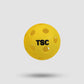 Tornado Sports neon green outdoor pickleball (40 small holes) vs. orange indoor pickleball (26 large holes) for gyms, parks, or tournaments.