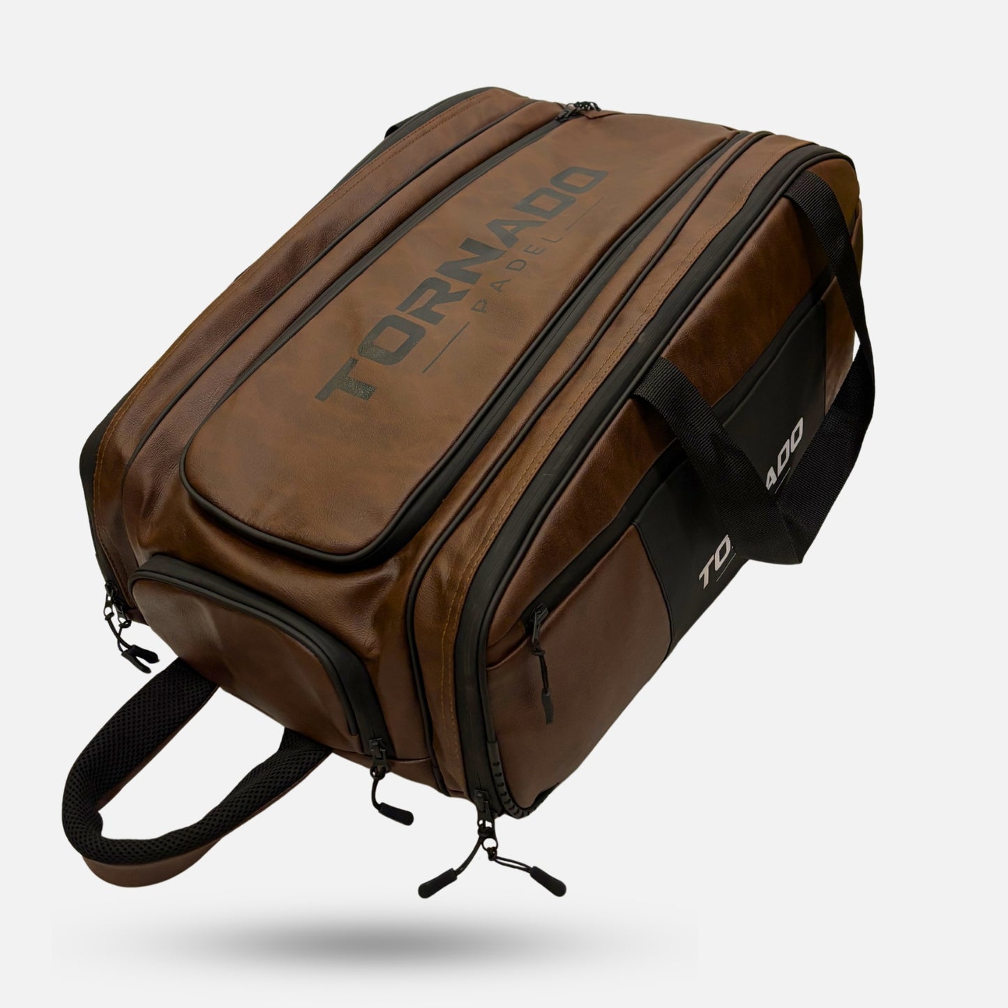 Tornado Padel Bag 2026 Leather Brown with insulated racket compartments, shoe storage, backpack straps, and court hanging hook. best padel bags 2026