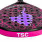 Close-up of a padel racket head with a black and pink floral pattern, a purple central logo, and a bright pink frame band with white 'TSC' lettering. for women and kids 