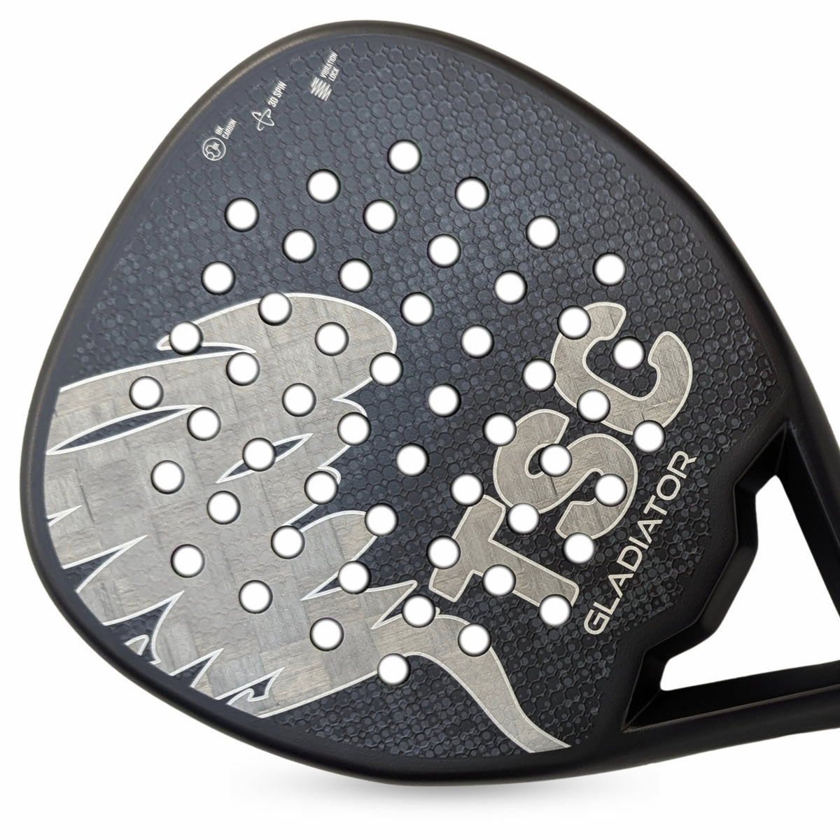 Close-up of a black and gray TSC Gladiator paddle padel frame head with a textured face, circular port holes, and a silver graphic logo on a white background. Padel racket in spain Nox adidas 
