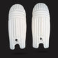 Pair of white cricket leg guards on a black background molded cricket pads front side for men