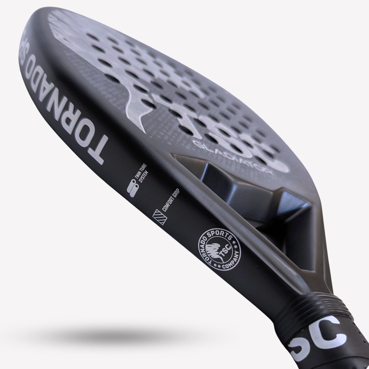 Padel racket with 'Tornado' branding on a white background close up navy blue padel racket 18k carbon fibre best racket in the world