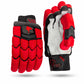 A pair of TSC cricket  batting gloves shown from both the back and palm views on a white background. The gloves feature a vibrant red padded design with black accents and a white palm side.